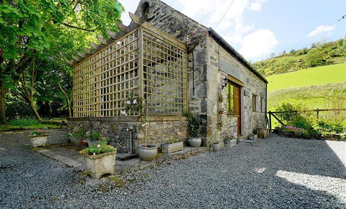 The Coach House with ample parking and garden.